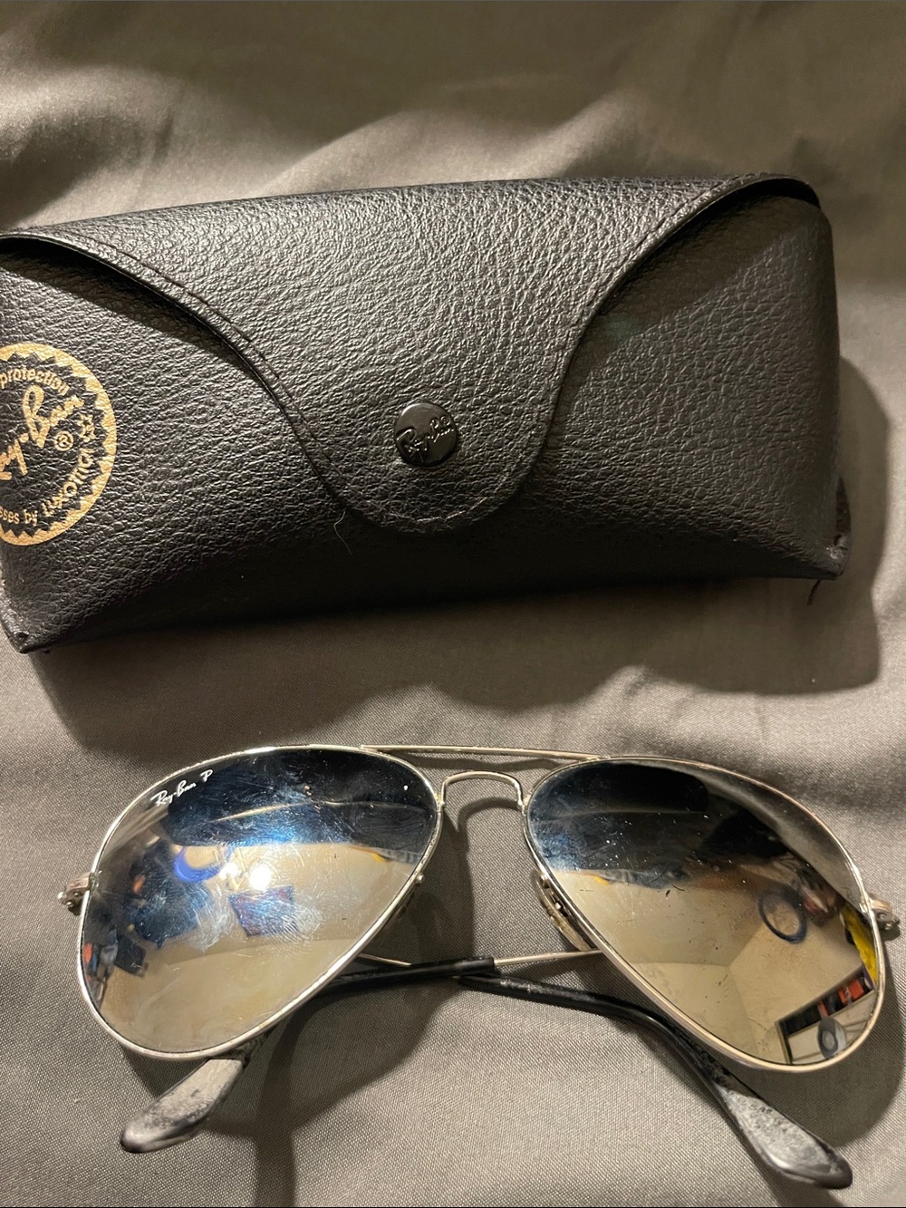 Ray-Ban Silver Frame Aviator Sunglasses with Black Temples and Dark Lenses